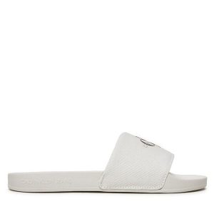 Klapki Calvin Klein Jeans. Białe klapki Calvin Klein Jeans, bez wzorów, z jeansu, bez obcasa. Za 109,99 zł.