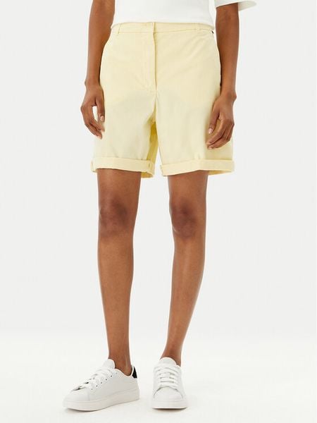 Tommy Hilfiger Szorty materiałowe WW0WW42457 Żółty Regular Fit. Żółte szorty TOMMY HILFIGER, bez wzorów, z bawełny. Za 439,99 zł.