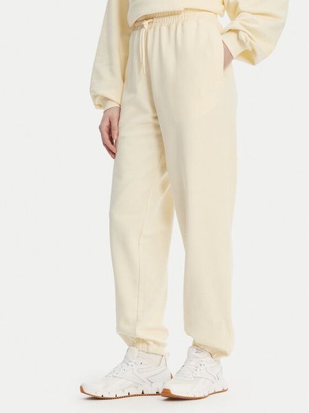 Reebok Spodnie dresowe RK25529CCW Żółty Regular Fit. Żółte spodnie dresowe Reebok, m, bez wzorów, z bawełny. Za 199,99 zł.