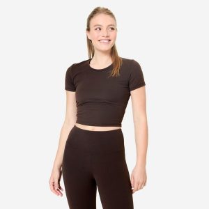 Koszulka do jogi i pilatesu Breathe. Zielone bluzki DOMYOS, l, bez wzorów, z elastanu, sportowe, bez kołnierzyka, bez ramiączek. Za 64,99 zł.