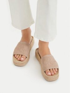 Calvin Klein Klapki Flatf Espa Mule Nub Mg HW0HW02890 Beżowy. Brązowe klapki Calvin Klein, bez wzorów, bez obcasa. Za 449,99 zł.