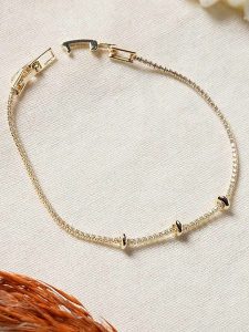 Lodie Silver Pozłacana bransoletka z cyrkoniami rozmiar: onesize. Szare bransoletki Lodie Silver, z cyrkonią, metalowe. Za 69,99 zł.