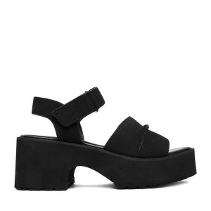 Sandały JENNY. Czarne sandały Jenny, bez wzorów, bez obcasa, na słupku, bez zapięcia. Za 139,99 zł.