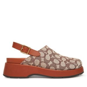 Sandały Coach. Brązowe sandały Coach, bez wzorów, bez obcasa, na płaskiej podeszwie, bez zapięcia. Za 519,99 zł.