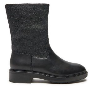 Botki Calvin Klein. Czarne botki Calvin Klein, bez wzorów, bez obcasa, na płaskiej podeszwie, bez zapięcia. Za 409,99 zł.