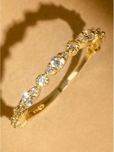 L instant d Or Złoty pierścionek "Relation" z cyrkoniami rozmiar: 60. Żółte pierścionki L instant d Or, z cyrkonią, złote. Za 717,99 zł.