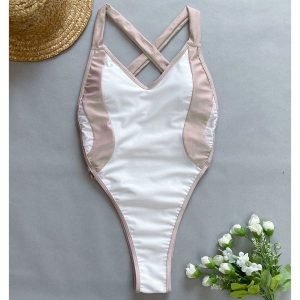 Strój kąpielowy jednoczęściowy z krzyżującymi ramiączkami odporny na chlor Otylie. Czerwone stroje jednoczęściowe Intica, bez wzorów, z materiału. Za 159,00 zł.