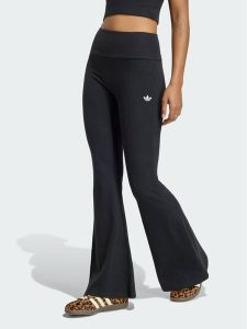 Adidas Legginsy Essentials KR3600 Czarny Flared Leg. Czarne legginsy ADIDAS, bez wzorów, z bawełny. Za 219,99 zł.