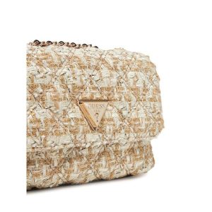 Torebka Guess. Żółte torebki klasyczne Guess, z aplikacjami, bez dodatków. Za 359,99 zł.