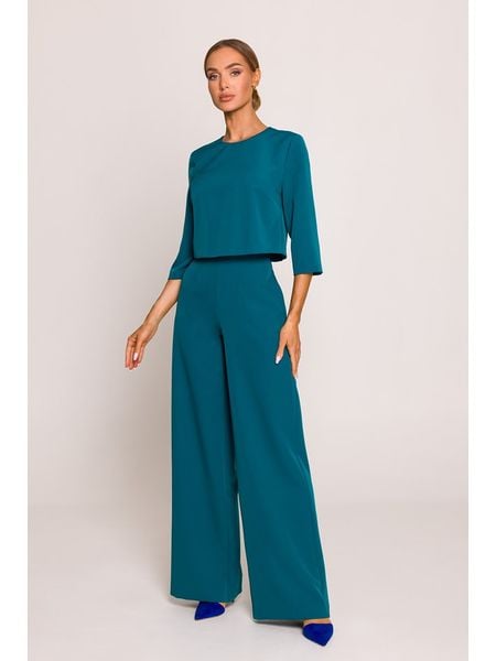 Made of emotion Kombinezon w kolorze niebieskim rozmiar: L. Niebieskie kombinezony Made Of Emotion, l, bez wzorów, bez kołnierzyka, bez ramiączek. Za 272,31 zł.