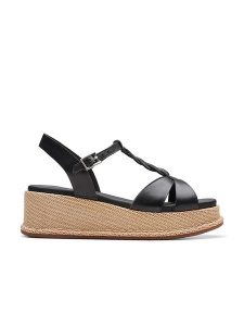 Clarks Skórzane sandały "Kimmei" w kolorze czarnym na obcasie rozmiar: 39,5. Czarne sandały Clarks, bez wzorów, z otwartym noskiem, bez obcasa, na koturnie, bez zapięcia. Za 263,53 zł.