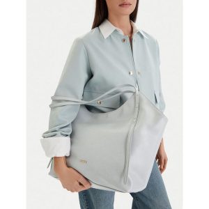 Torebka JENNY. Niebieskie shopper bag Jenny, bez wzorów, bez dodatków. Za 149,99 zł.