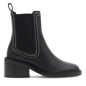 Botki GINO ROSSI. Czarne botki Gino Rossi, bez wzorów, bez obcasa, na słupku, bez zapięcia. Za 399,99 zł.