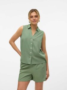 Vero Moda Bluzka w kolorze zielonym rozmiar: XS. Zielone bluzki Vero Moda, xs, bez wzorów, bez kołnierzyka, bez ramiączek. Za 43,99 zł.