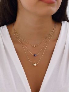 Nakkash Pozłacany naszyjnik z elementami ozdobnymi rozmiar: onesize. Żółte naszyjniki Nakkash, metalowe. Za 39,99 zł.