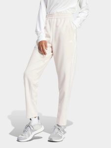 Adidas Spodnie dresowe Train Essentials IS3969 Różowy Loose Fit. Czerwone spodnie dresowe ADIDAS, m, bez wzorów, z dresówki. Za 129,99 zł.