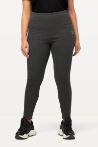 Damskie Legginsy sztuczne futerko od wewnątrz bardzo ciepłe wysoki stan. Szare legginsy Ulla Popken, bez wzorów, z bawełny, z podwyższonym stanem. Za 279,99 zł.