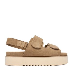 Sandały Roxy. Brązowe sandały Roxy, bez wzorów, bez obcasa, na płaskiej podeszwie, bez zapięcia. Za 179,99 zł.