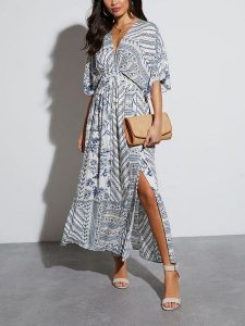 Milan Kiss Sukienka w kolorze kremowym rozmiar: M. Brązowe sukienki Milan Kiss, m, bez wzorów, bez kołnierzyka, bez ramiączek, maxi. Za 165,99 zł.