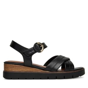 Sandały Tamaris. Czarne sandały Tamaris, bez wzorów, bez obcasa, na koturnie, bez zapięcia. Za 349,99 zł.