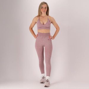 Damski zestaw sportowy - Legginsy/Crop Top - Różowy. Czerwone legginsy XTREME, bez wzorów, z poliamidu, krótkie. W wyprzedaży za 197,80 zł.