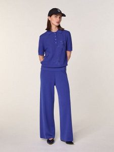 Rodier Wełniana koszulka w kolorze niebieskim rozmiar: S. Niebieskie bluzki Rodier, s, bez wzorów, z wełny, bez kołnierzyka, bez ramiączek. Za 260,99 zł.