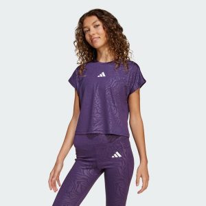 Koszulka All Sports Animal Print Crop. Białe bluzki ADIDAS, bez wzorów, sportowe, bez kołnierzyka, bez ramiączek. Za 119,00 zł.