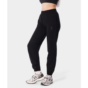 Spodnie dresowe sportowe dla kobiet Carpatree Varsity Chic. Czarne spodnie dresowe Carpatree, bez wzorów, z dresówki, na fitness i siłownię. W wyprzedaży za 212,49 zł.