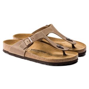 Damskie japonki Birkenstock Gizeh Oiled Leather brązowe wąskie 943813. Brązowe klapki Birkenstock, bez wzorów, z materiału, bez obcasa. Za 409,00 zł.