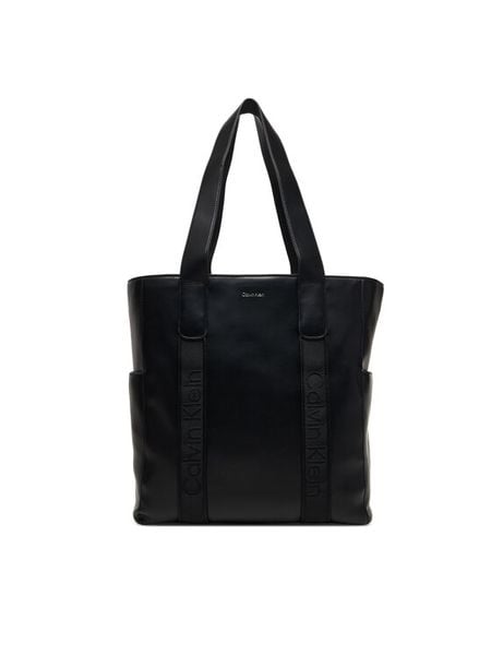 Calvin Klein Torebka Webbing Strap Tote LV04F3289G Czarny. Czarne shopper bag Calvin Klein, bez wzorów, ze skóry, bez dodatków. Za 569,99 zł.