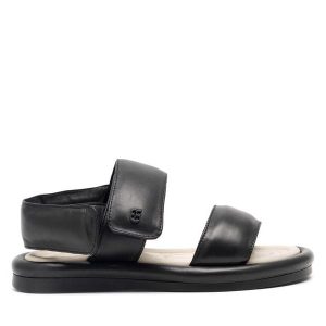 Sandały GINO ROSSI. Czarne sandały Gino Rossi, bez wzorów, bez obcasa, na płaskiej podeszwie, bez zapięcia. Za 399,99 zł.