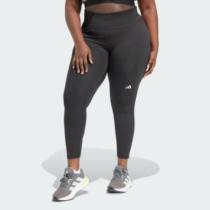Legginsy Own the Run 7/8 (Plus Size). Czarne legginsy ADIDAS, bez wzorów, z materiału. W wyprzedaży za 181,35 zł.