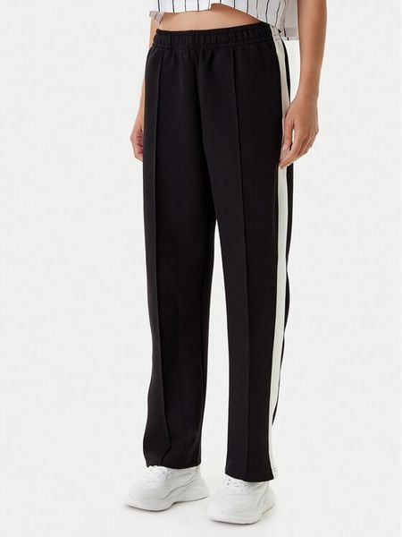 Karl Kani Spodnie dresowe PD00005427 Czarny Regular Fit. Czarne spodnie dresowe Karl Kani, xl, bez wzorów, z dresówki. Za 139,99 zł.