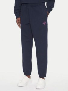 Calvin Klein Jeans Spodnie dresowe Monologo LV047B235G Granatowy Regular Fit. Niebieskie spodnie dresowe Calvin Klein Jeans, s, bez wzorów, z bawełny. Za 329,99 zł.