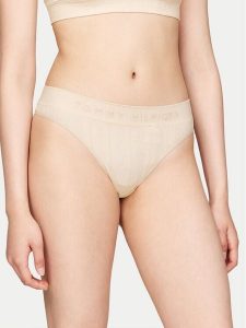 Tommy Hilfiger Stringi UW0UW05503 Beżowy. Brązowe stringi TOMMY HILFIGER, bez wzorów, z syntetyku. Za 79,99 zł.