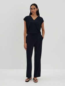 Someday Kombinezon w kolorze granatowym rozmiar: 38. Niebieskie kombinezony someday., bez wzorów, bez kołnierzyka, bez ramiączek. Za 322,73 zł.