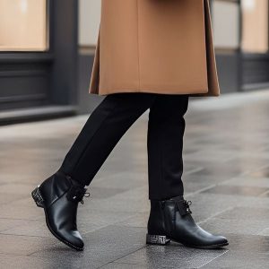 Botki damskie Armodo, ocieplane futerkiem zapinane na suwak i na płaskim obcasie, czarne, 1396. Czarne botki Armodo, bez wzorów, ze skóry, bez obcasa, na obcasie, bez zapięcia. Za 407,99 zł.