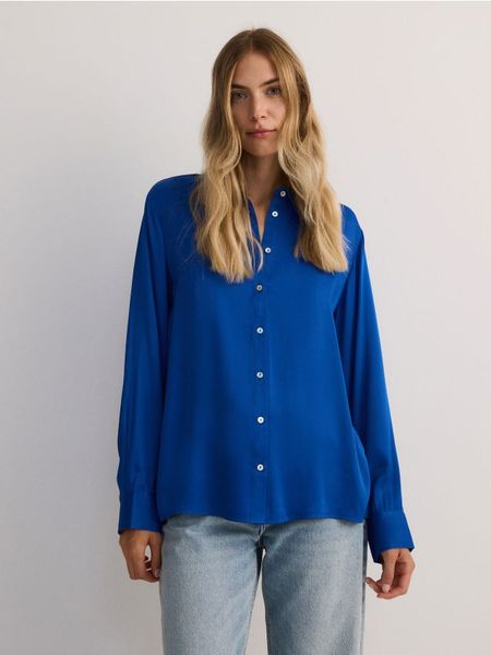 Koszula z wiskozy - niebieski. Niebieskie koszule Reserved, l, bez wzorów, z wiskozy, bez kołnierzyka, bez ramiączek. W wyprzedaży za 59,99 zł.