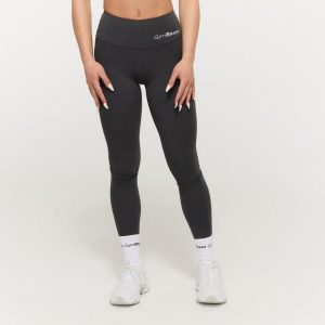 Legginsy damskie fitness z wysokim stanem Charcoal BEAT. Szare legginsy GYMBEAM, bez wzorów, z elastanu, z podwyższonym stanem. Za 112,90 zł.