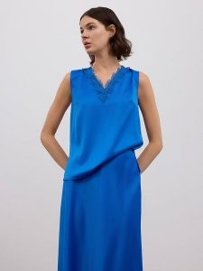 BGN Top w kolorze niebieskim rozmiar: 38. Niebieskie topy BGN, bez wzorów, bez kołnierzyka, bez ramiączek. Za 56,99 zł.