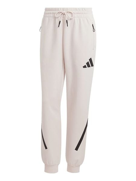 Adidas Spodnie dresowe "Z.N.E." w kolorze kremowym rozmiar: S. Brązowe spodnie dresowe ADIDAS, s, bez wzorów, z dresówki. Za 157,32 zł.