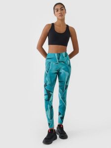 4F Legginsy treningowe z wysokim stanem damskie - turkusowe L. Niebieskie legginsy 4f, bez wzorów, z dzianiny, z podwyższonym stanem. W wyprzedaży za 99,99 zł.
