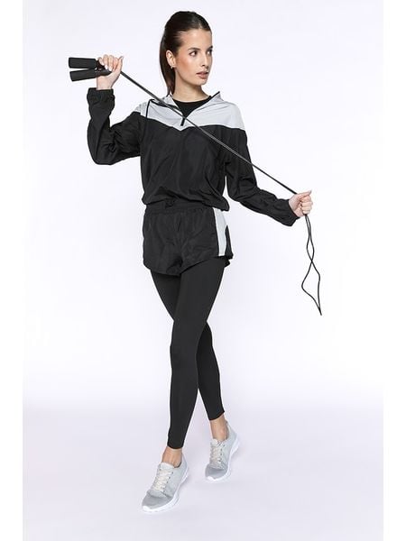 Onamaste Legginsy sportowe "Adele" w kolorze czarnym rozmiar: L/XL. Czarne legginsy Onamaste, bez wzorów, z podwyższonym stanem. Za 130,81 zł.