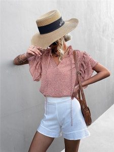 Ariel Tesoro Bluzka w kolorze szaroróżowym rozmiar: 42. Różowe bluzki Ariel Tesoro, bez wzorów, bez kołnierzyka, bez ramiączek. Za 118,84 zł.