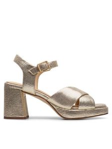 Clarks Sandały Ritzy75 Rae 26181303 Złoty. Żółte sandały Clarks, bez wzorów, ze skóry, bez obcasa, na słupku, bez zapięcia. Za 379,99 zł.