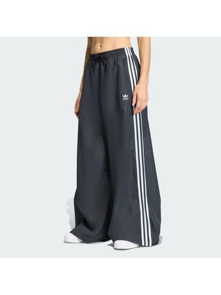 Adidas Spodnie dresowe Firebird Adilenium KD2914 Czarny Regular Fit. Czarne spodnie dresowe ADIDAS, s, bez wzorów, z dresówki. Za 398,99 zł.