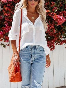 Milan Kiss Bluzka w kolorze białym rozmiar: L. Białe bluzki Milan Kiss, l, bez wzorów, z bawełny, bez kołnierzyka, bez ramiączek. Za 122,67 zł.