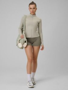 4F Legginsy krótkie treningowe damskie - oliwkowe XL. Brązowe legginsy 4f, bez wzorów, z podwyższonym stanem, krótkie. Za 79,99 zł.