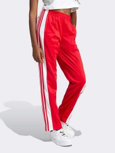 Adidas Spodnie dresowe w kolorze czerwonym rozmiar: L. Czerwone spodnie dresowe ADIDAS, l, bez wzorów, z dresówki. Za 217,95 zł.