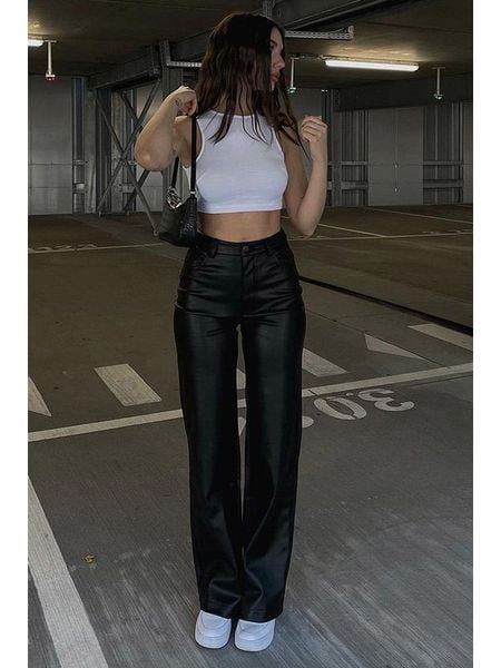 Trendyol Spodnie w kolorze czarnym rozmiar: L. Czarne spodnie z wysokim stanem Trendyol, bez wzorów, z materiału, z podwyższonym stanem. Za 139,95 zł.